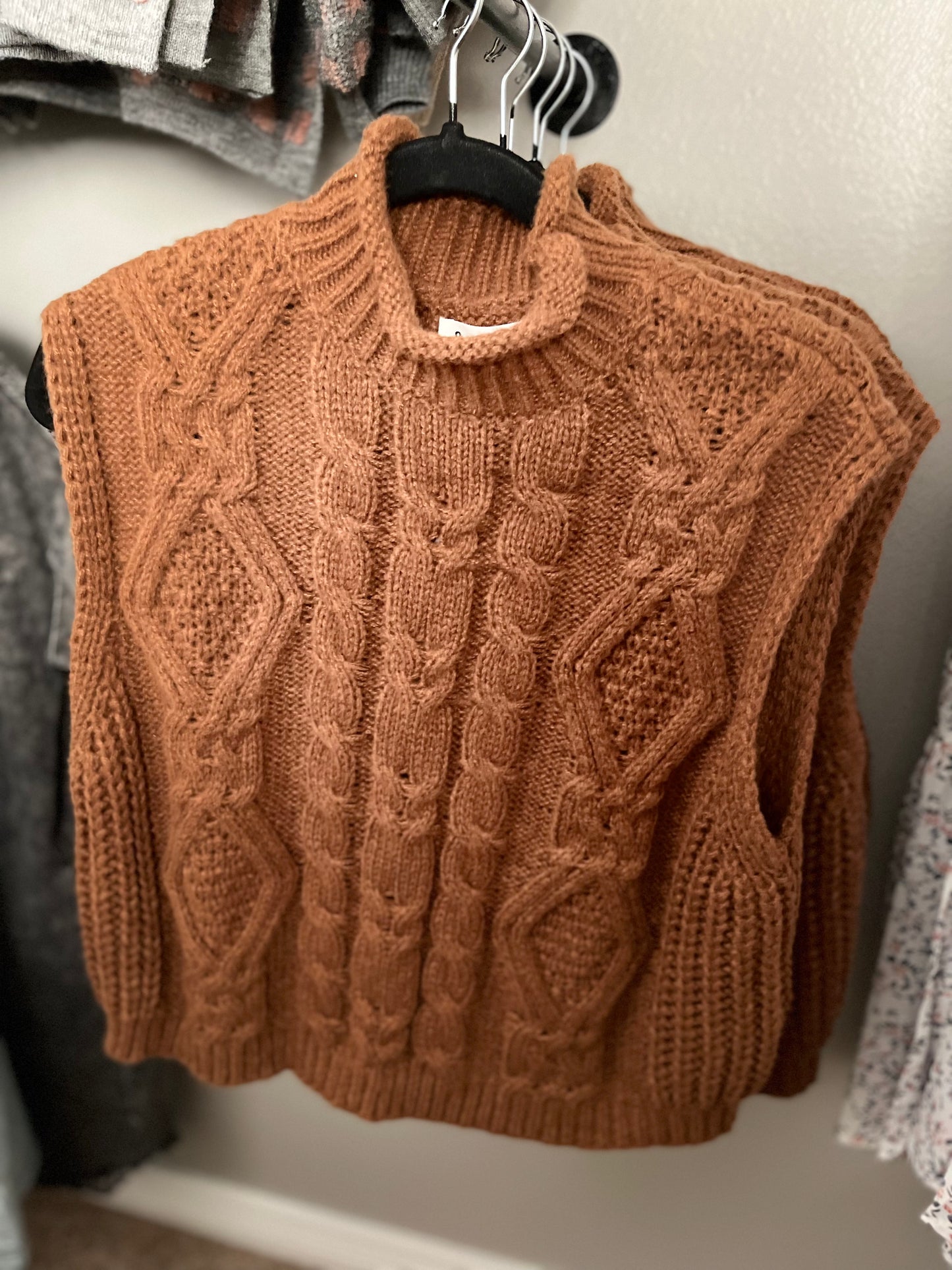 Brown sweater vest